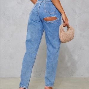 Brand new pretty little thing jeans with bum rip size 4 still in bag with tag